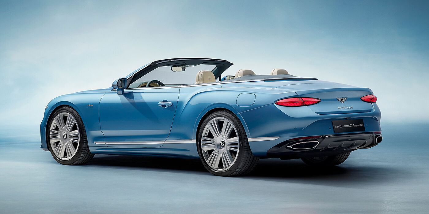 Bentley Antwerp New Bentley Continental GTC Azure convertible rear view in Light Windsor blue paint with 22 inch ten spoke wheels and chrome exterior details