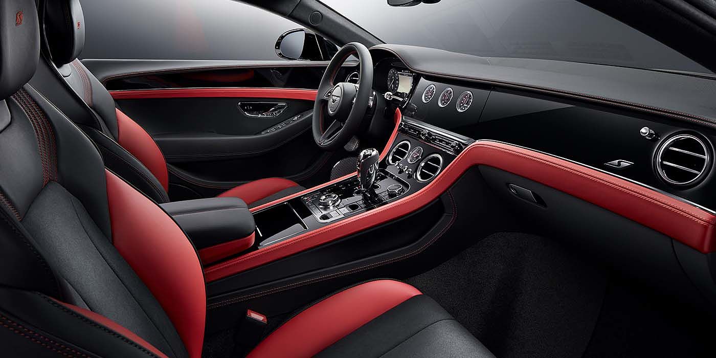 Bentley Antwerp Bentley Continental GT S coupe front interior in Beluga black and Hotspur red hide with high gloss Carbon Fibre veneer
