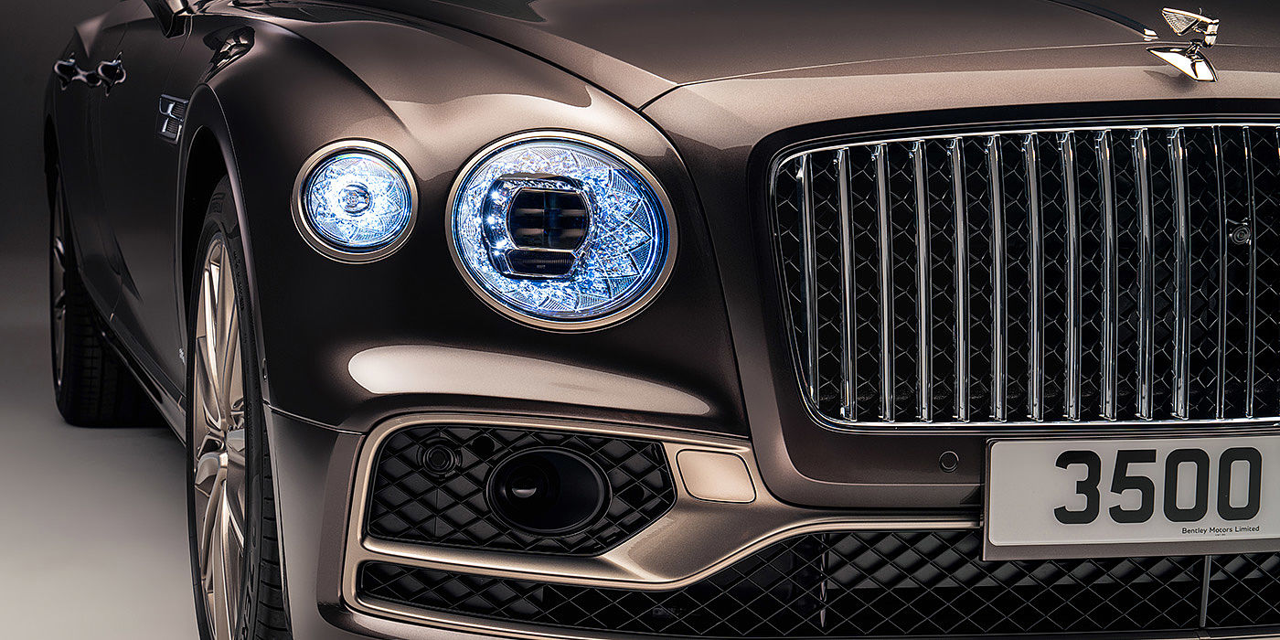 Bentley Antwerp Bentley Flying Spur Odyssean sedan front grille and illuminated led lamps with Brodgar brown paint