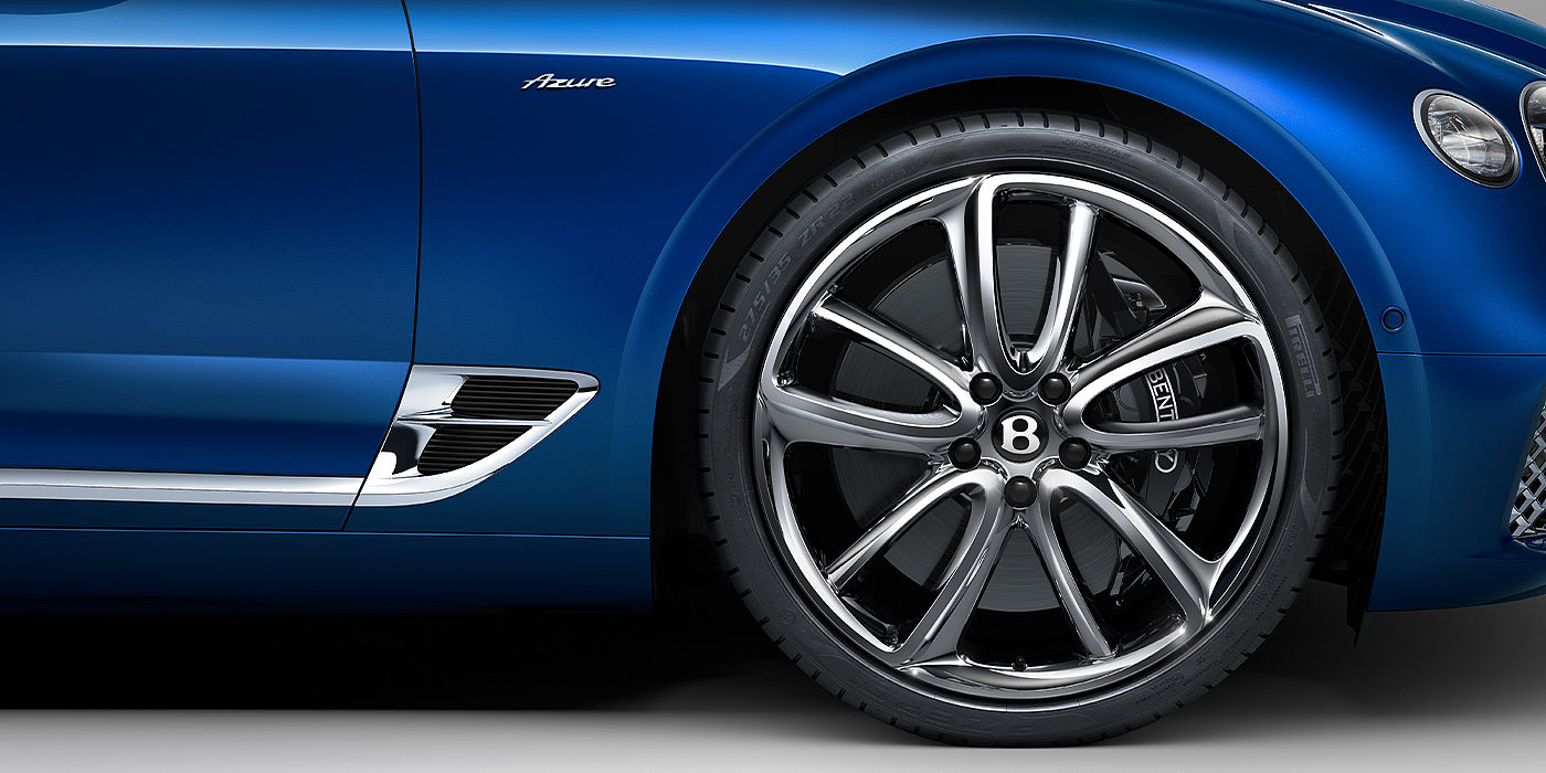 Bentley Antwerp Bentley Continental GT Azure coupe in Sequin Blue paint side close up with Azure badge