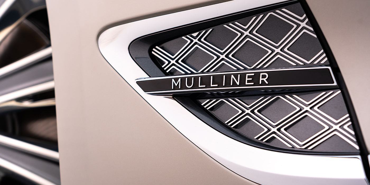 Bentley Antwerp Bentley Continental GT Mulliner coupe in White Sand paint Mulliner wing vent close up