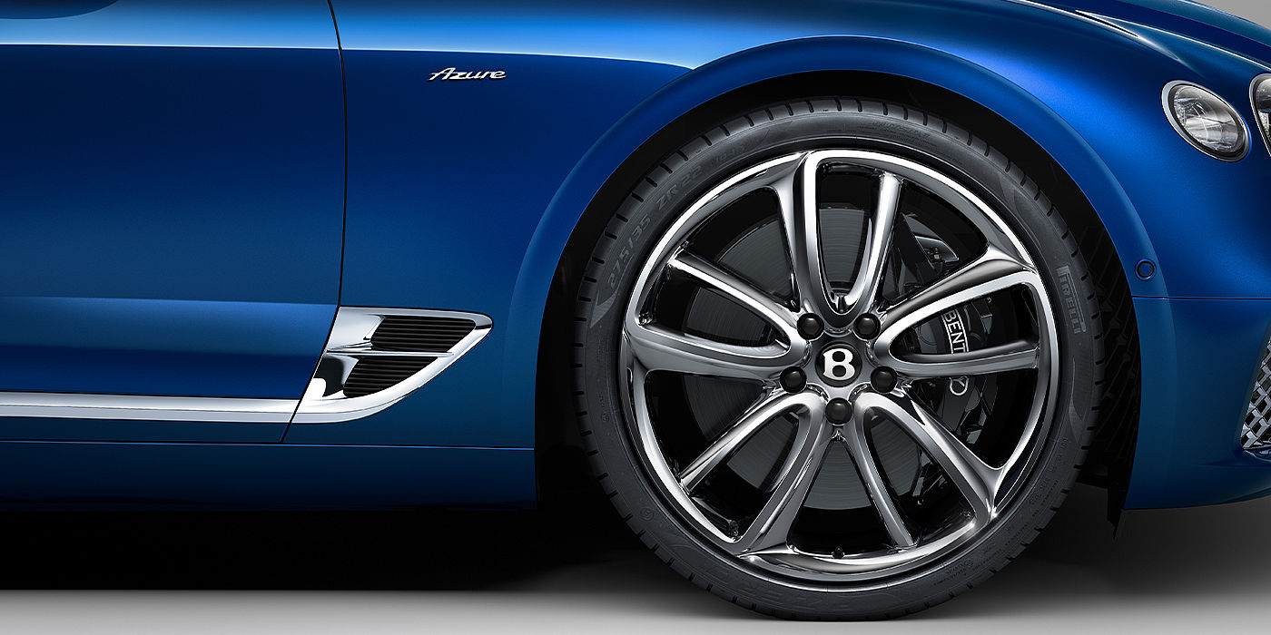 Bentley Antwerp Bentley Continental GTC Azure convertible in Sequin Blue paint side profile with Azure badge close up